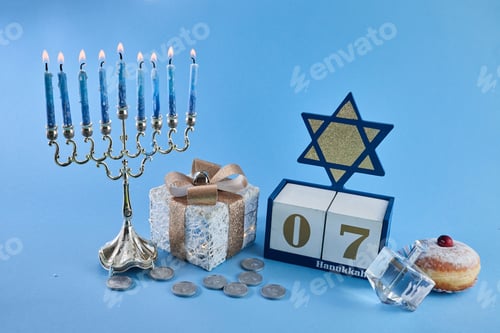 Preview: Jewish holiday Hanukkah with menorah, traditional Candelabra, donut and dreidel, spinning top.