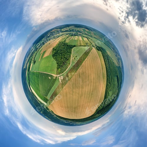 Preview: Aerial view from high altitude of little planet earth with yellow cultivated agricultural fields