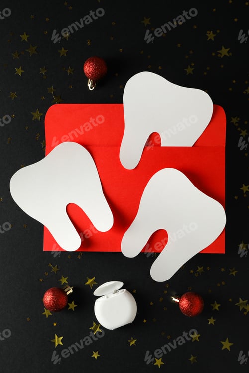 Preview: A tooth with a New Year's decoration around it.