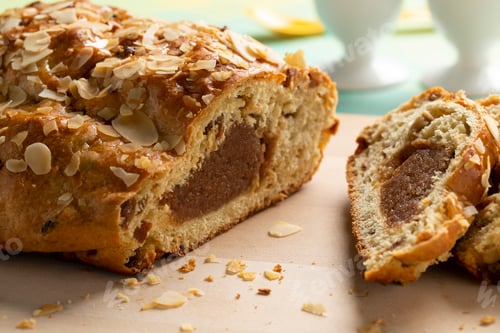 Preview: Traditional Dutch homemade easter bread with almond paste,cinnamon and almonds
