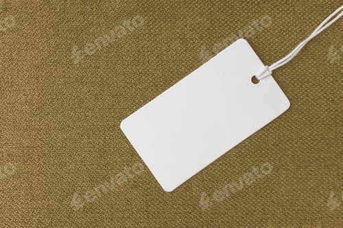Preview: Textile Background, Yellow Coarse Fabric Texture With White Empty Clothing Tag