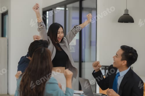 Preview: Business partners are congratulating each other on exceeding their sales targets, A group of company