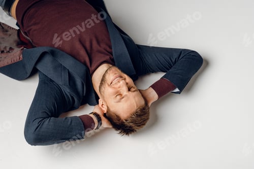 Preview: Fashion male model in studio. Confident male casual suit.