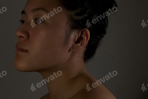 Preview: Side view of a sad woman