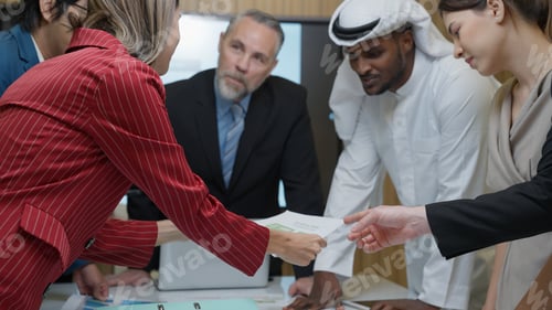 Preview: Business officer team consulting together with new project