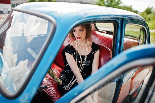 Preview: Vintage car and girl