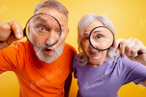 Preview: Mature couple finding something new and fascinating, expressing curiosity and surprise