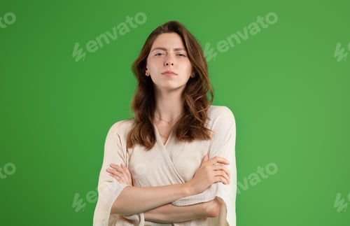 Preview: Serious confident proud calm pretty young european lady student in casual with crossed arms on chest