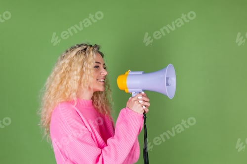 Preview: Young blonde woman with long curly hair