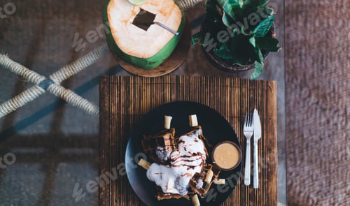 Preview: Sweet dessert with delicious topping served on glass transparent table