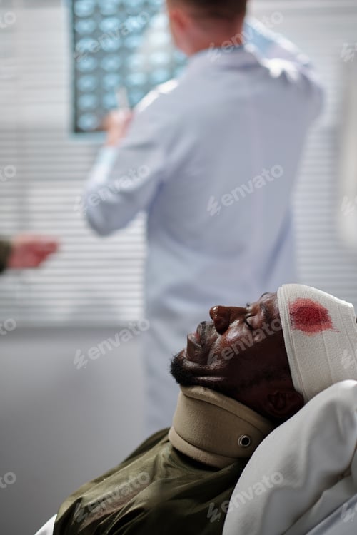 Preview: Wounded patient lying in ward