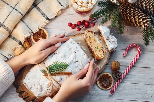 Preview: Stollen with holiday decorations. Christmas background