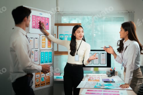 Preview: UI UX designer team brainstorming mobile app wireframes