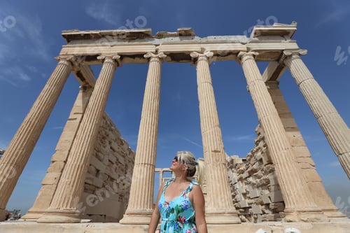 Preview: A blond woman wandering around Acropolis in Athens, Greece