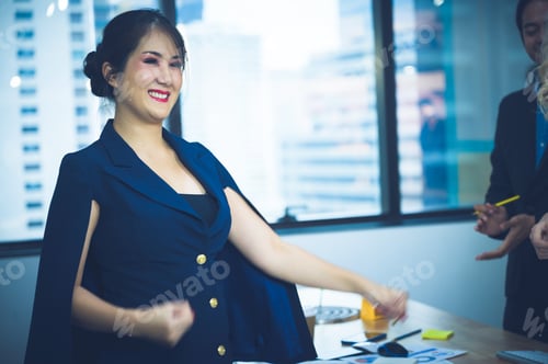 Preview: A business woman present the project idea to worker colleague at the office