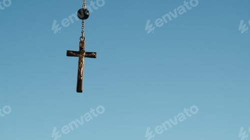 Preview: Silhouette of crucifix with sky background