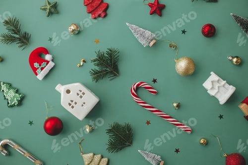 Preview: Modern Christmas banner. Stylish christmas festive decorations on green background flat lay