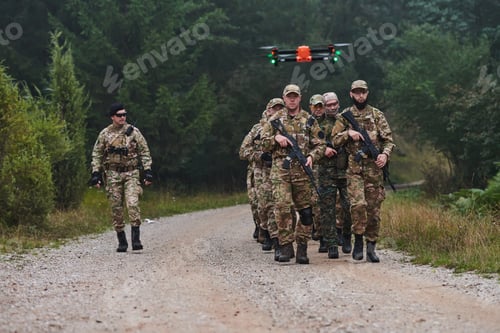 Preview: An elite military unit, led by a major, confidently parades through dense forest, showcasing