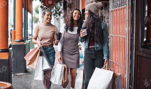 Preview: Cropped shot of an attractive group of sisters bonding together during a shopping spree in the city