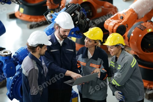 Preview: Robotics engineer working on maintenance of robotic arm in factory warehouse. Business technology.
