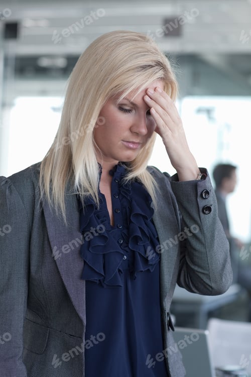 Preview: Stressed businesswoman