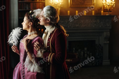 Preview: Caucasian Young Woman and Young Man Reenacting Baroque Era Romance Indoors