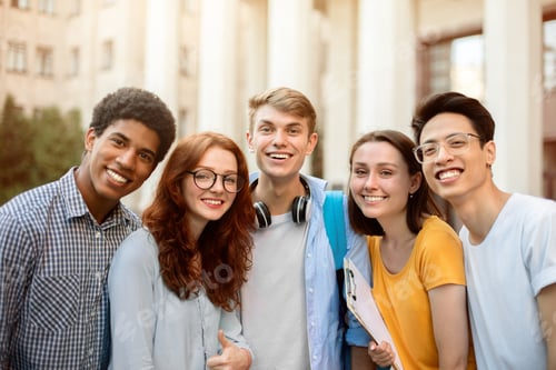 Preview: Joyful Multiethnic Students Posing Smiling To Camera Standing Outside College
