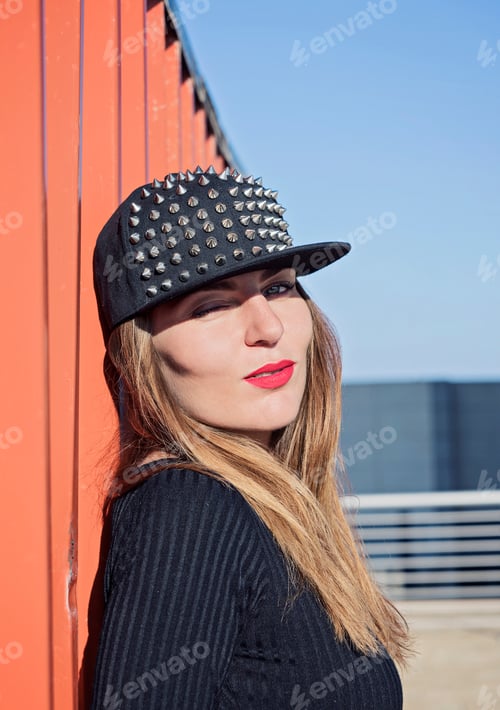 Preview: Portrait of a beautiful girl hipster wearing a cap with paillettes