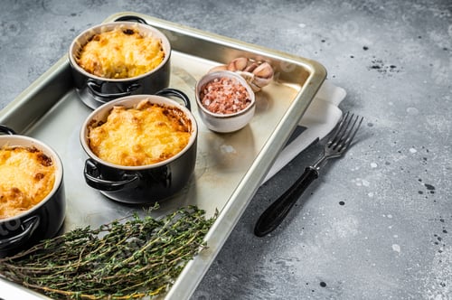 Preview: Irish Shepherd's pie with mince meat, mashed potato and cheddar cheese crust. Gray background