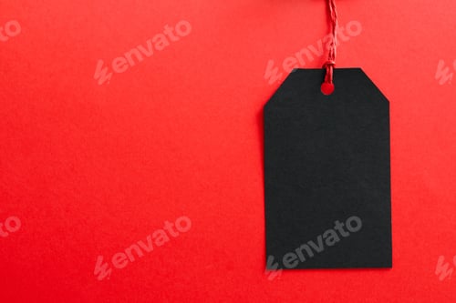 Preview: Blank Black Tag on a Red Background