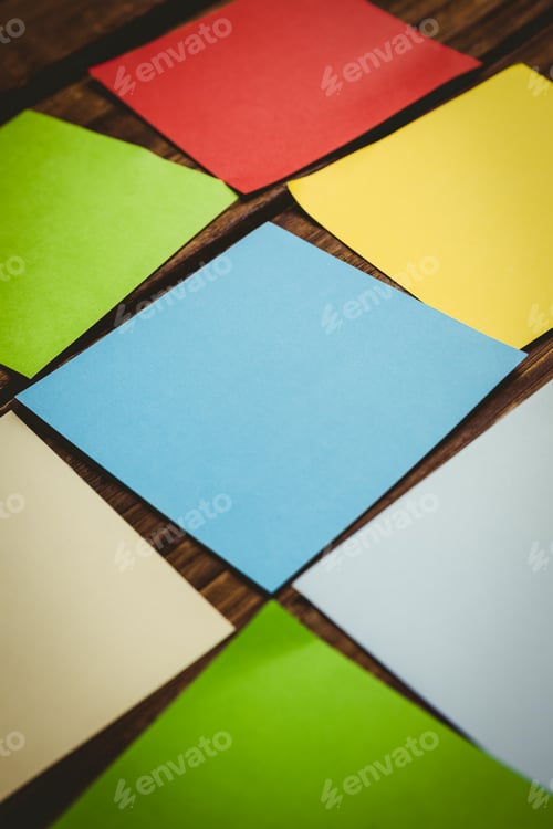 Preview: Colorful sticky post its on wooden background