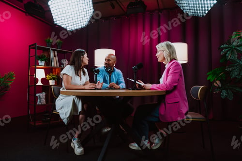 Preview: Content creators recording a podcast interview in studio