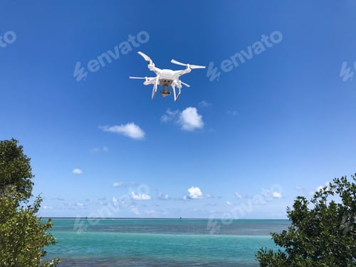 Preview: DJI P4 Phantom drone hovering over Florida Keys