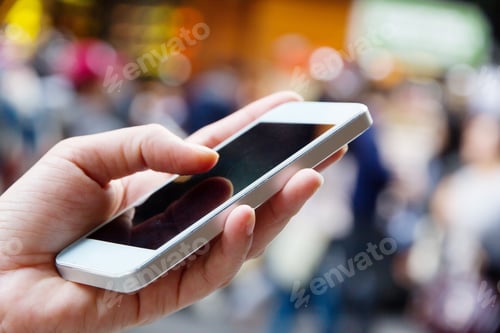 Preview: Teenage girl text messaging on her phone