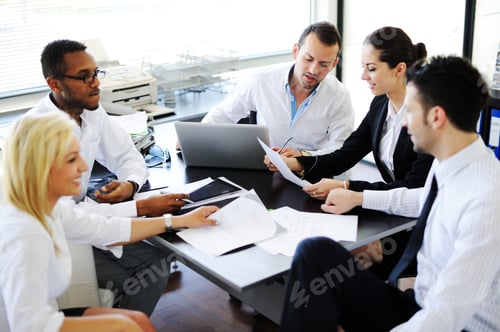 Preview: Business People Working In Office Having Meeting