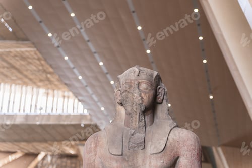 Preview: Majestic statue of pharaoh in grand museum setting