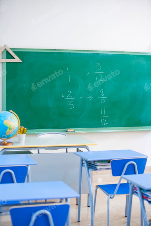Preview: Math Problems on Green Chalkboard in Classroom
