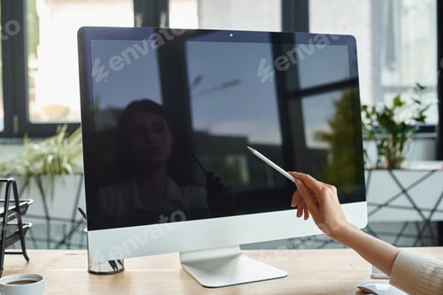 Preview: Digital symphony: businesswoman crafting franchise success on computer screen