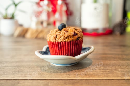 Preview: Homemade baked blueberry muffin on wooden table