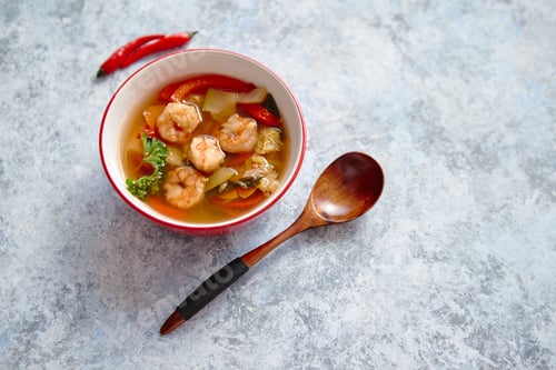 Preview: Traditional Tom Yum spicy Thai soup with shrimp