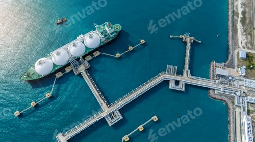 Preview: LNG (Liquified Natural Gas) tanker anchored in Gas terminal gas tanks for storage. Oil Crude Gas