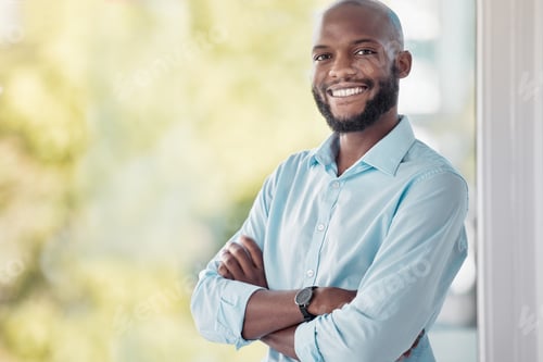 Preview: Working toward my goals. Shot of a young businessman taking a break during his work day.