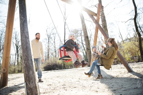 Preview: Happy family on playground