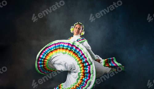 Preview: A woman in a colorful dress is dancing