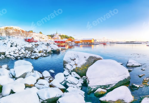Preview: Stunning winter scenery of Moskenes village with ferryport and famous Moskenes parish Churc