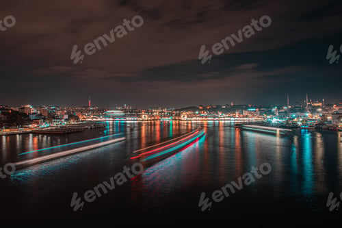 Preview: Cityscape view at night of Istanbul city and Bosphorus strait