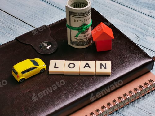 Preview: Loan alphabets made of square letter tiles on the notebooks.