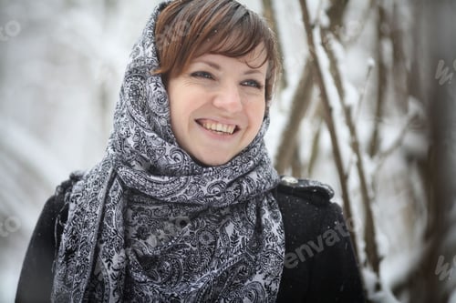 Preview: Portrait Of A Beautiful Russian Girl In The Cold Winter In The National Scarf