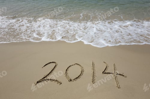 Preview: Year 2014 Hand Written On The White Sand In Front Of The Sea
