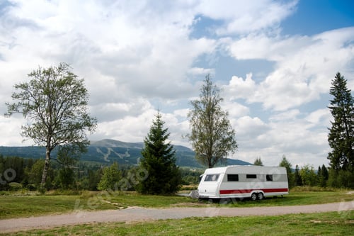 Preview: parked trailer near mountains in Trysil, Norway's largest ski resort
